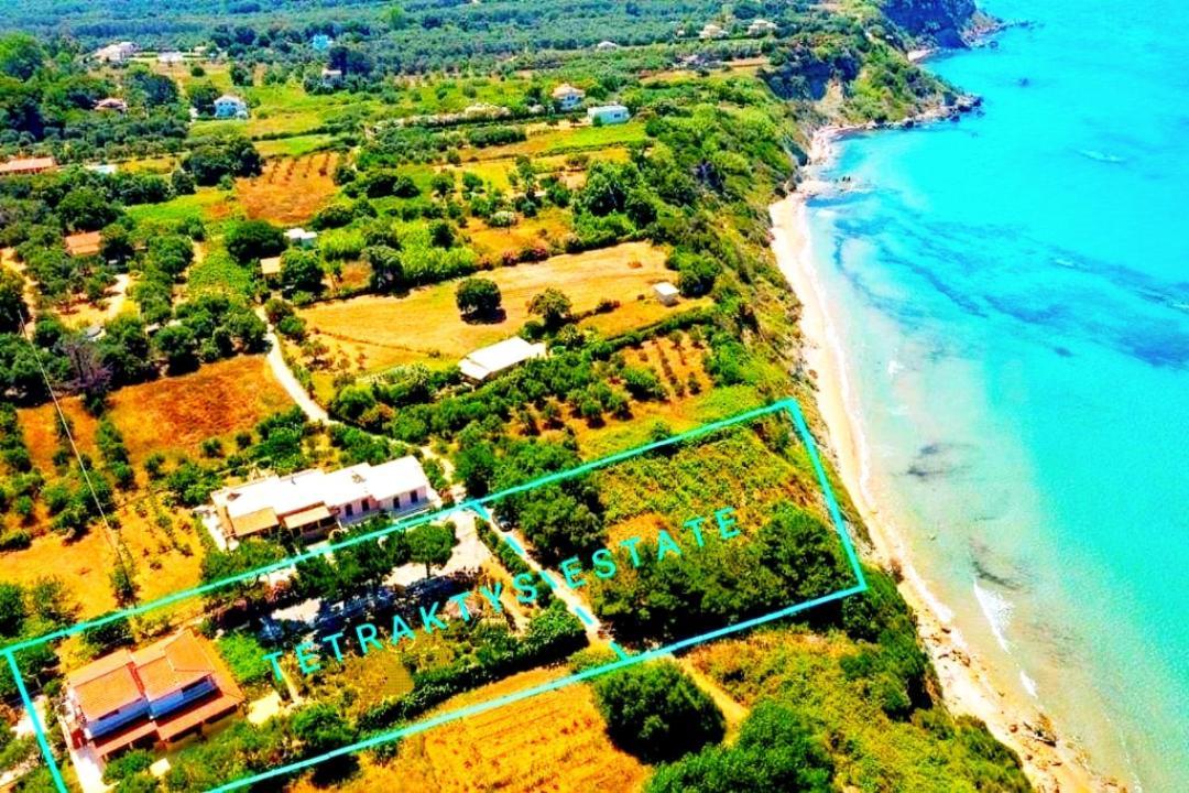 Tetraktys Estate Beachside Υδωρ Ágios Matthaíos Bagian luar foto