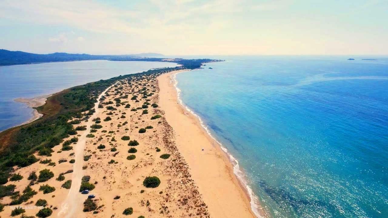 Tetraktys Estate Beachside Υδωρ Ágios Matthaíos Bagian luar foto